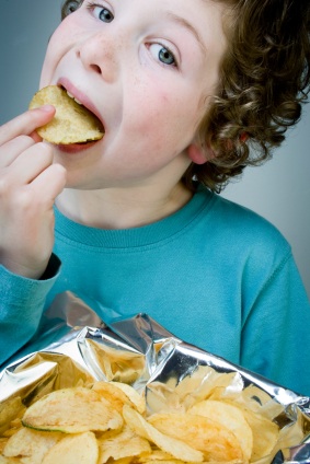 Boy eating chips
